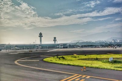 Road in city against sky