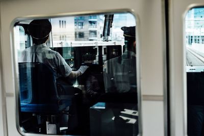 Man sitting in train