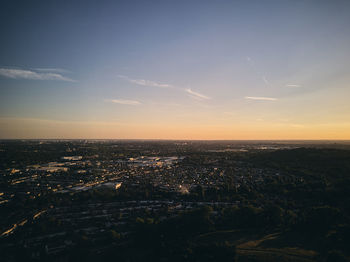 High angle view of buildings against sky during sunset