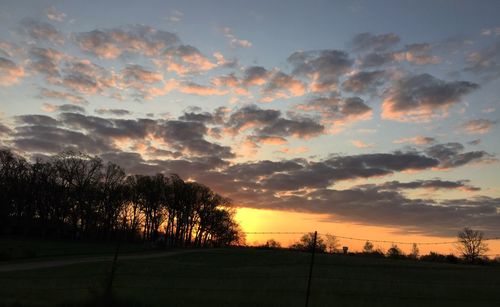 Scenic view of landscape at sunset