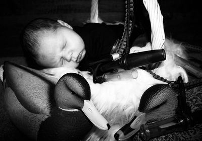 Boy sleeping on sofa