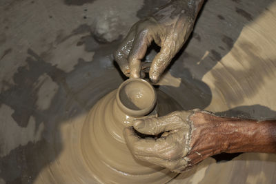 Cropped image of man working in workshop