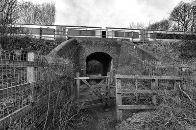 View of old bridge against sky