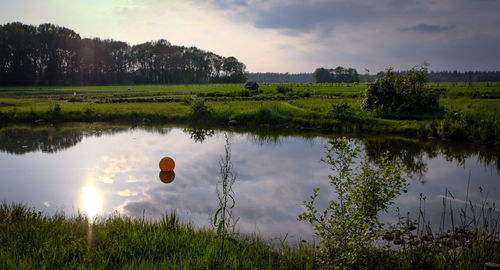 Scenic view of lake against sky