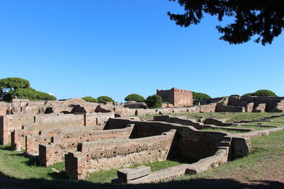 Old ruins against clear blue sky