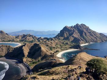 Scenic view of mountains against clear blue sky