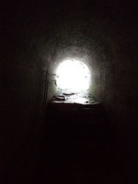 Archway of old building in tunnel