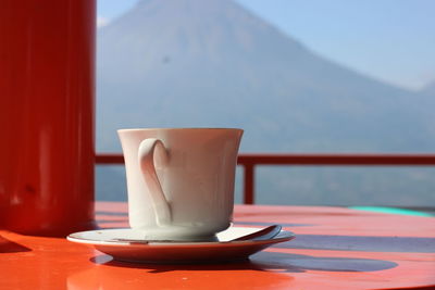 Close-up of coffee cup on table