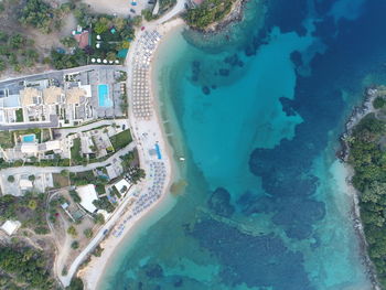 Aerial view of city by sea