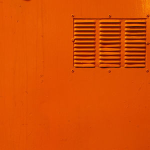 Full frame shot of orange metal locker