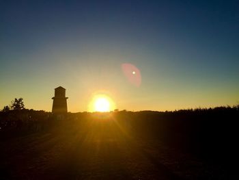 Sun shining through landscape