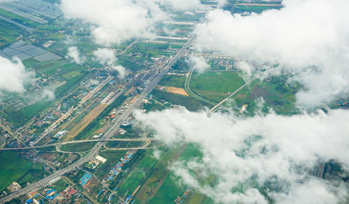 Aerial view of cityscape against sky