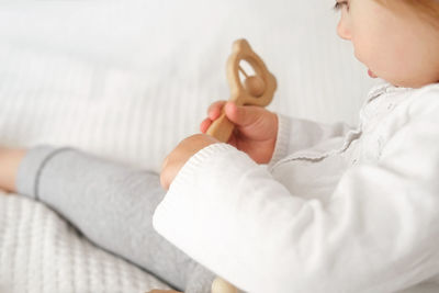 Close-up of baby boy with daughter at home