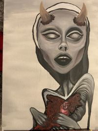 Close-up of statue against wall