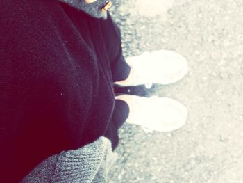 Close-up of woman standing in pond