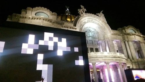 Low angle view of illuminated built structure