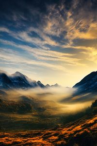 Scenic view of mountains against sky during sunset