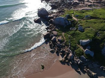 High angle view of rocks on beach