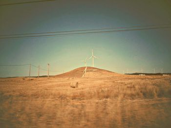 Windmills on landscape