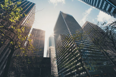 Low angle view of skyscrapers against sky