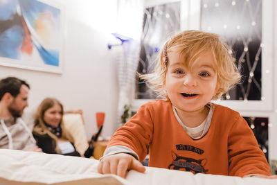 Portrait of cute smiling girl at home