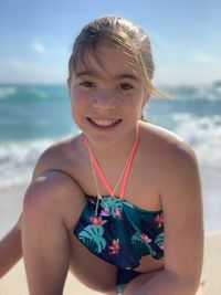 Portrait of smiling girl at beach