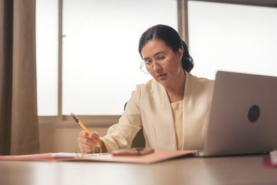 Businesswoman working at office