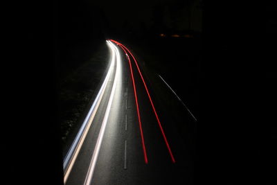 Light trails on road at night