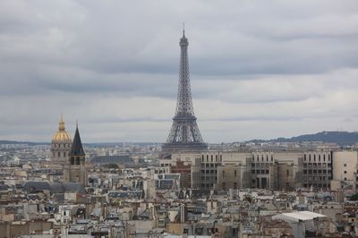 View of paris city with eiffel tower and les invalides monument with golden dome