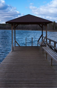 Pier over sea against sky
