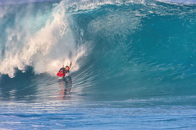 Man surfing in sea