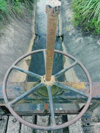 High angle view of abandoned bicycle wheel