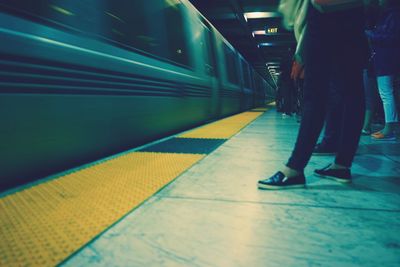 Blurred motion of people in subway