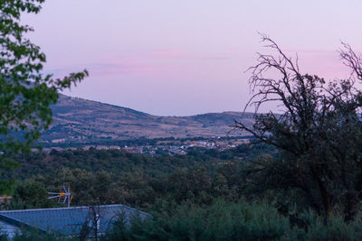 Scenic view of landscape against sky during sunset