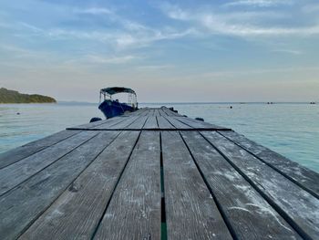 Pier over sea against sky