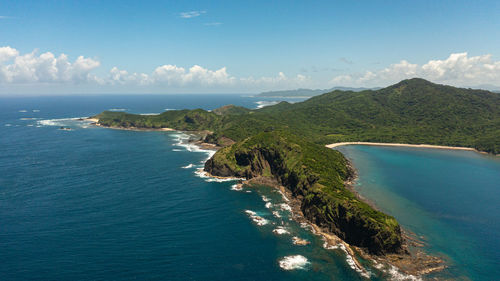 The coast of the island with beaches and rainforest. cape engano. palaui island.