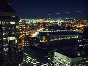 Illuminated cityscape at night