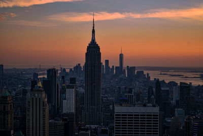 Cityscape against sky during sunset