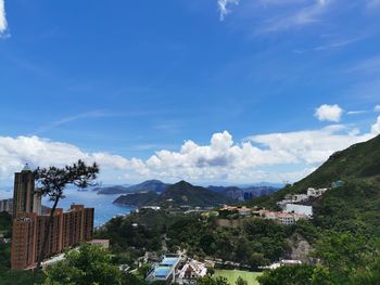 Buildings in city against sky