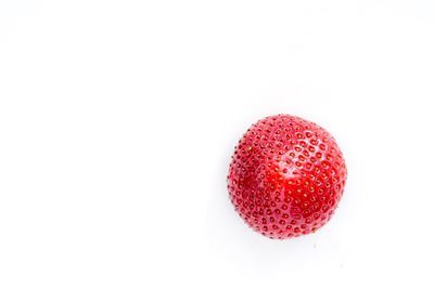 Close-up of strawberry against white background