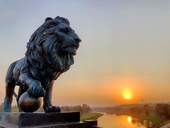 View of statue against sky during sunset