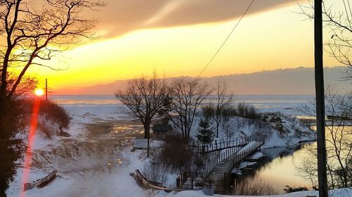 Scenic view of sunset over river