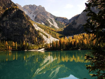 Scenic view of lake with mountains in background