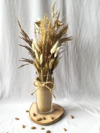 Close-up of vase on table at home