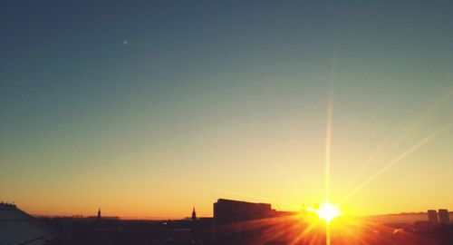 Sun shining through trees