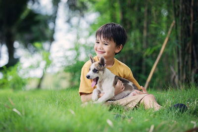 Portrait of a dog on field