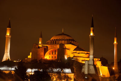 Facade of mosque at night