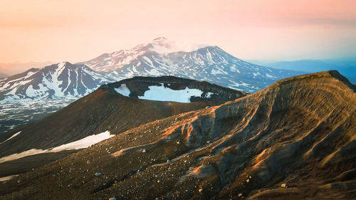 Scenic view of snowcapped mountains against sky.kamchatka,russia