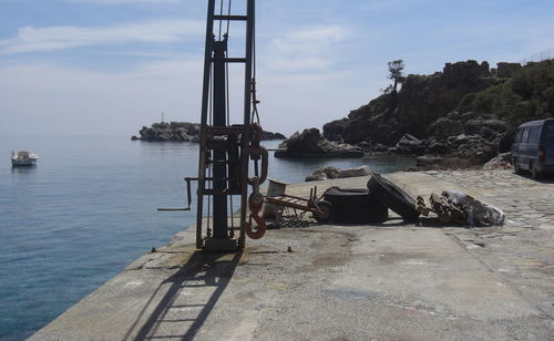 Pier on sea against sky