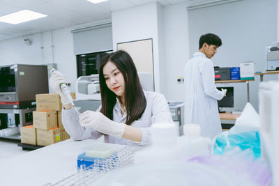 Young woman working in a room